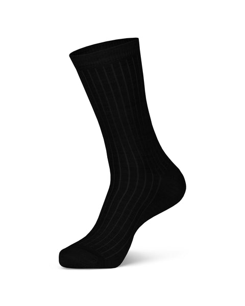Women's Merino Rib Crew Socks in black color in a white background, side view.