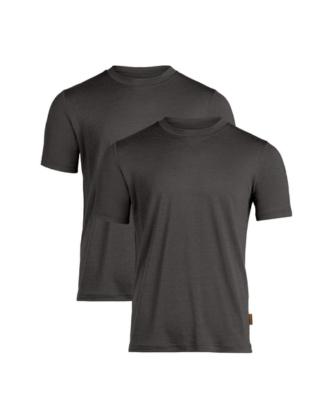 A flat-lay product shot of two men's short-sleeved, crew-neck t-shirts in a charcoal grey color. The shirts have a regular fit and a slightly heathered texture. They are displayed staggered, with one slightly behind and above the other, against a pure white background. The front shirt features a small brown tag on its lower left hem.
