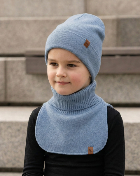 Child wearing blue Merino wool knit dickie and beanie, soft thermal neck warmer for winter