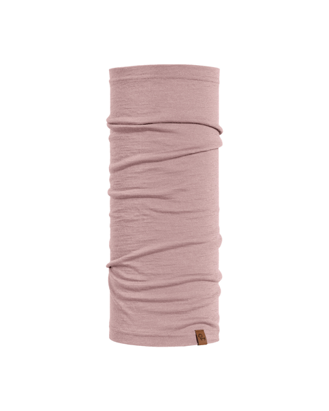 A product shot of a dusty pink tubular neck gaiter displayed upright against a pure white background. The fabric shows natural horizontal folds, and a small, square brown leather logo patch is visible near the bottom right edge.