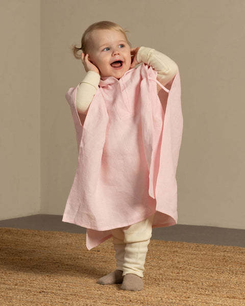 Linen baby poncho in dusty pink color