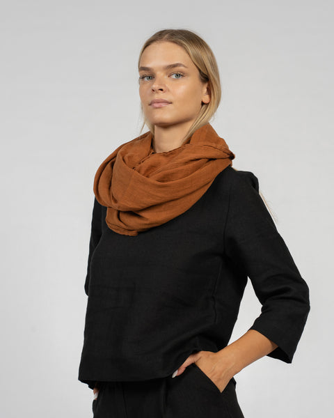 Woman wearing Linen Scarf in Almond Brown Color