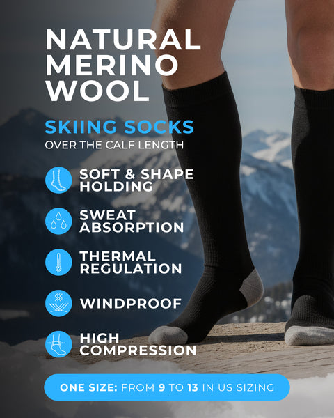 Person wearing black merino wool skiing socks with mountain background