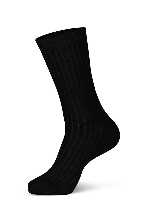 Women's Merino Rib Crew Socks in black color in a white background, side view.