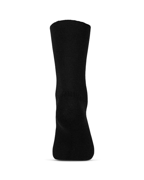 The menique women&#39;s merino lined sherpa socks in color black, in a white background, heel  view.