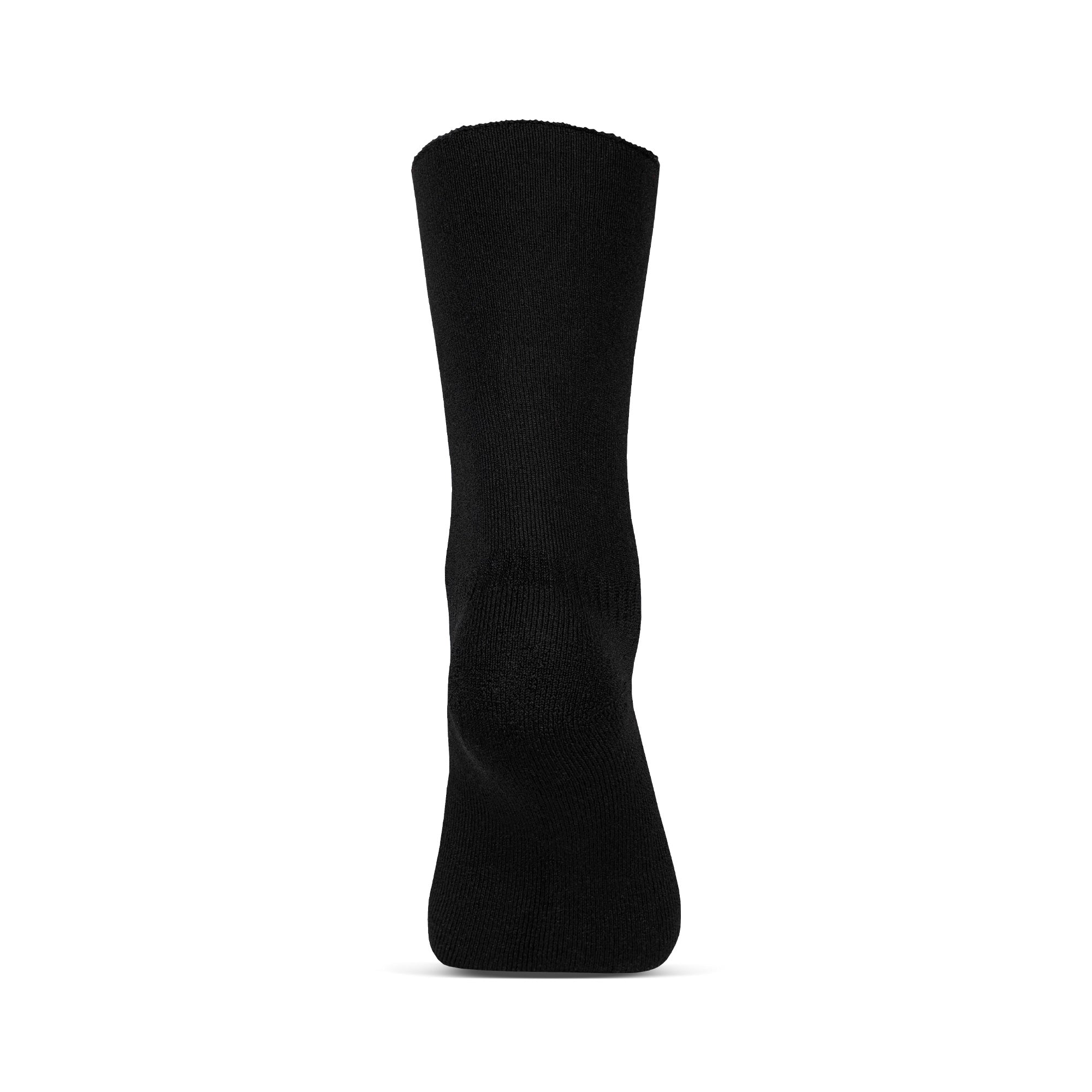 The menique women's merino lined sherpa socks in color black, in a white background, with the sock cuffed from a side view.