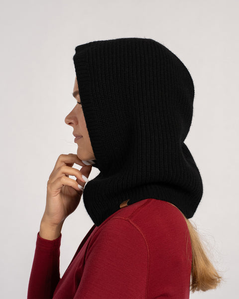Side view of woman in black knitted balaclava hood – ribbed design cashmere blend