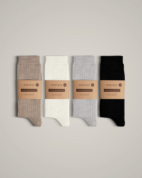 The menique women&#39;s merino wool ribbed crew socks in all available colors, with packaging.