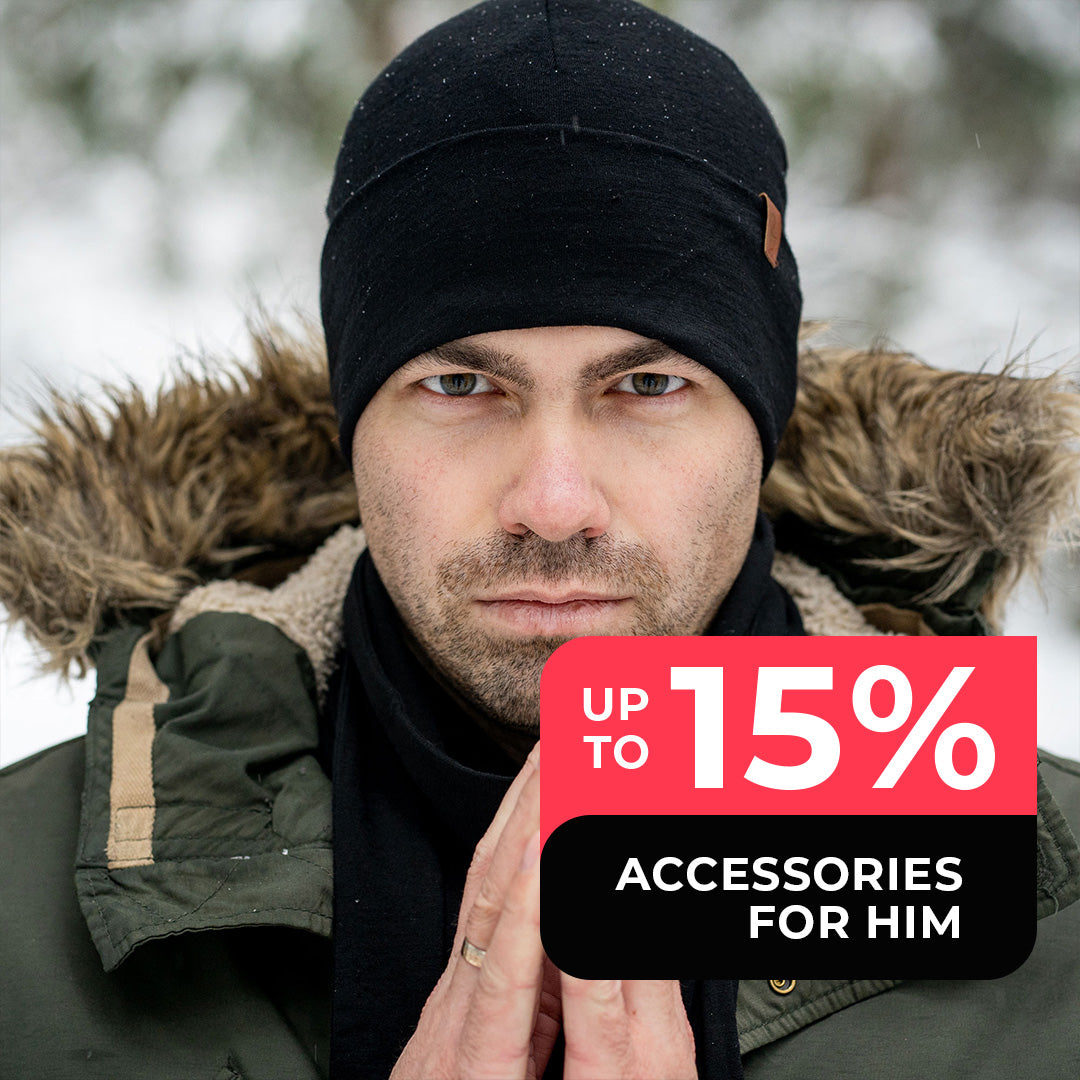 Serious man wearing merino wool beanie in black. Men's accessories on Black Friday sale up to 15% off.